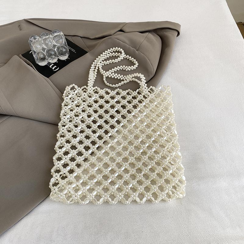 2025 New Summer Vacation Bag Boho Beach Hollow Out Shoulder Bag For Women Handmade Beading Handbag Silver Metal Top Handle Tote