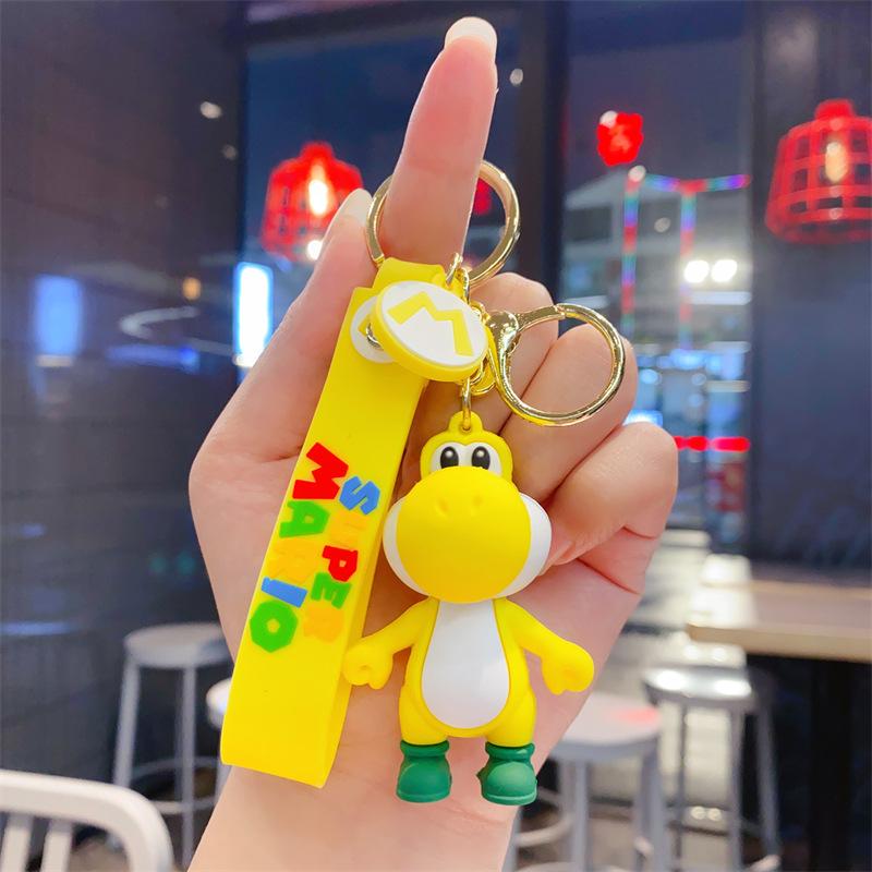 Милый брелок Маленький динозаврик Пузырчатый дракон для ключей Машина Пара Студенческий рюкзак Подвеска Наземный маркетинг Маленький подарок