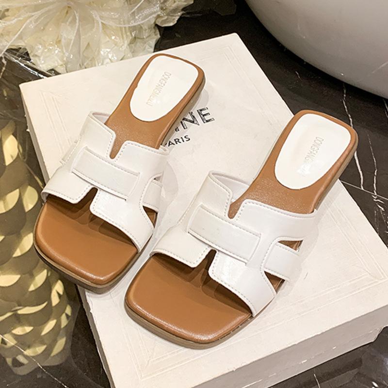 Versatile summer white outer slippers girl 2025 new niche fashion woven beach one-word drag fairy sandals