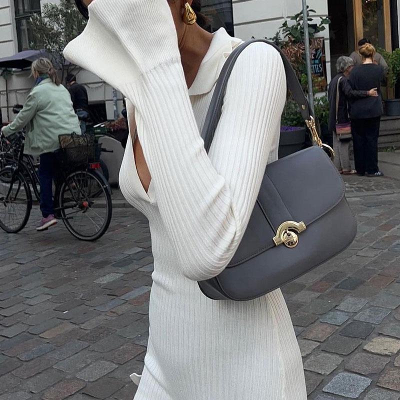 Vit stickad klänning med hög midja Mode kvinnor Ribbslagsslag Höst 2023 Smal Elegant Lång Klänning Casual Stickad Solid Festklänning