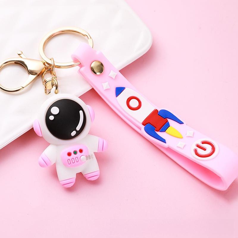 

Cartoon astronaut keychain, cute schoolbag tag, anti-lost astronaut and space rabbit figurine, couple pendant accessories рожевий