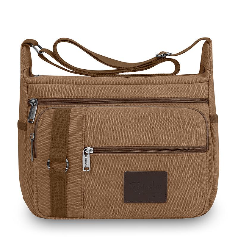 

Міцна канвасна сумка через плече з кількома кишенями – Стильна та практична сумка на плече для чоловіків та жінок коричневий