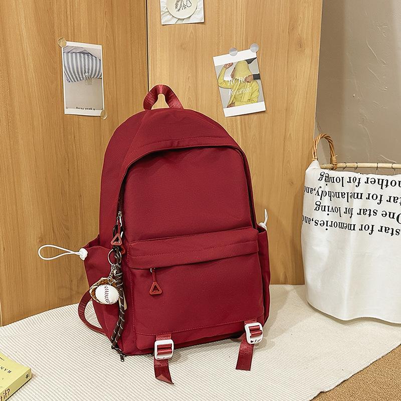 Schoolbag1011 new versatile black schoolbag male college student large capacity backpack female junior high school girl solid color backpack