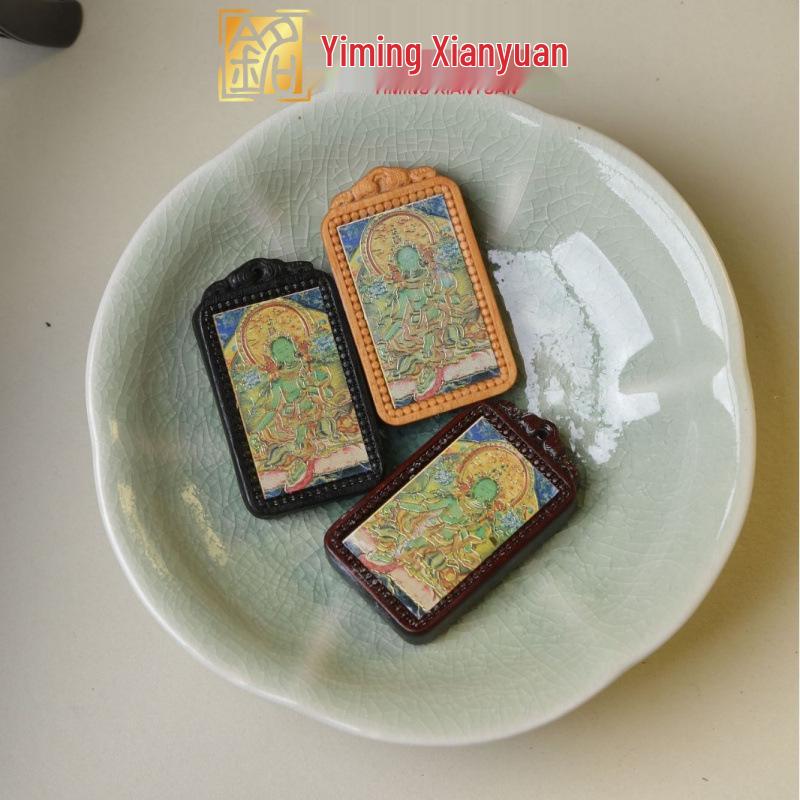 

Sandalwood Thangka Pendant with Wooden Duster Carving