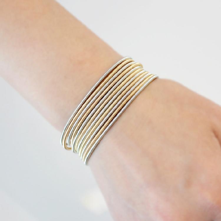 Infällbar Armband Kolstål Trådarmband Smycken Fjäderarmband Spolset