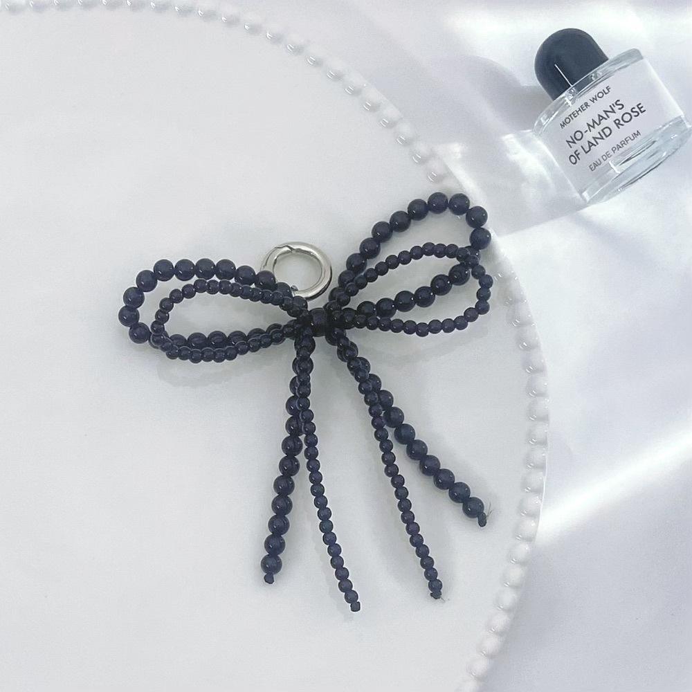 

INS Wind Mini Pearl Bow Fashion Anti-Lost Hand Carry Pendant Short Mobile Phone Chain чёрный