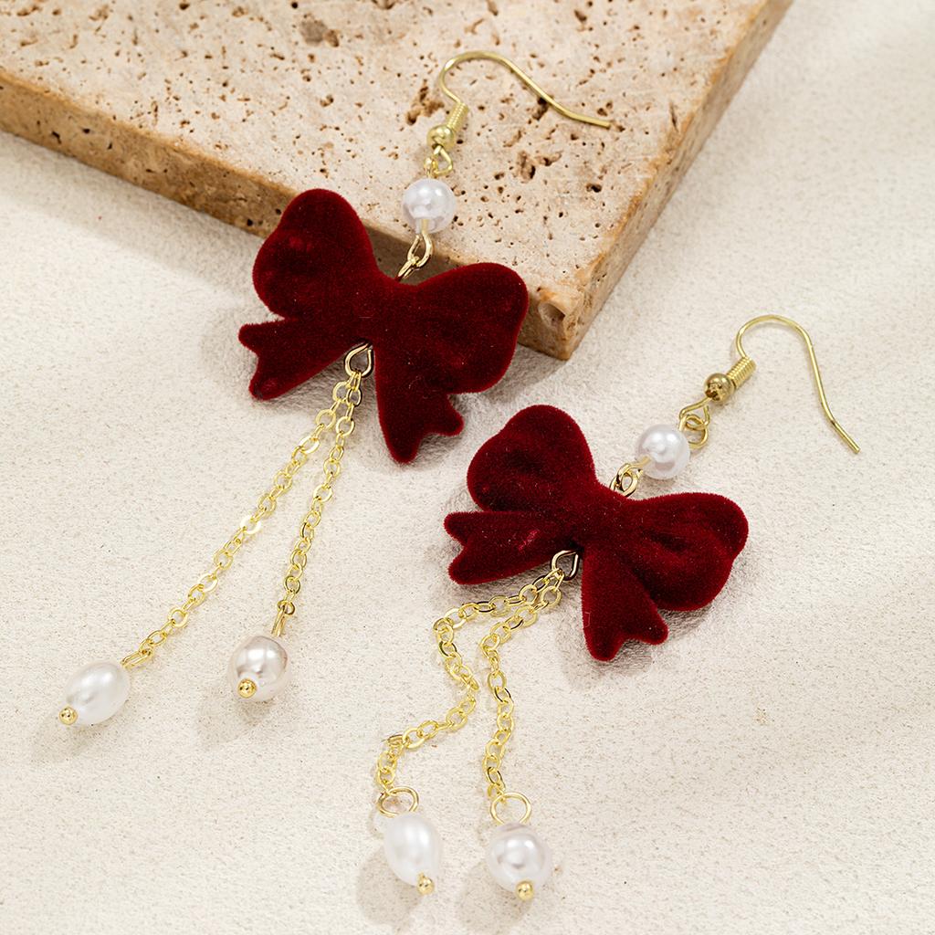 1 pair of red velvet bow imitation pearl pendant long women's earrings, versatile for daily use and suitable for holiday wear