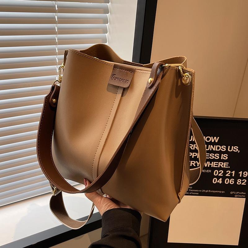 Women's Two-Tone Bucket Bag Stylish Faux Leather Crossbody Bag with Adjustable Strap Fashion Contrast-Trim Shoulder Bag