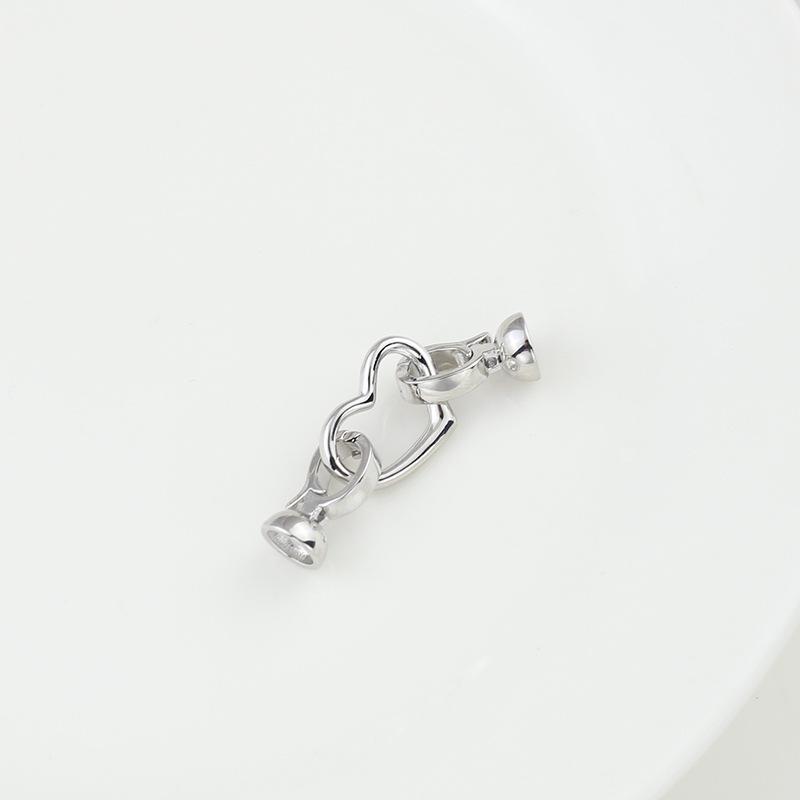 Naszyjnik i łącznik do bransoletki w kształcie owalnego brzoskwiniowego serca zachowujący kolor z podwójnym zapięciem