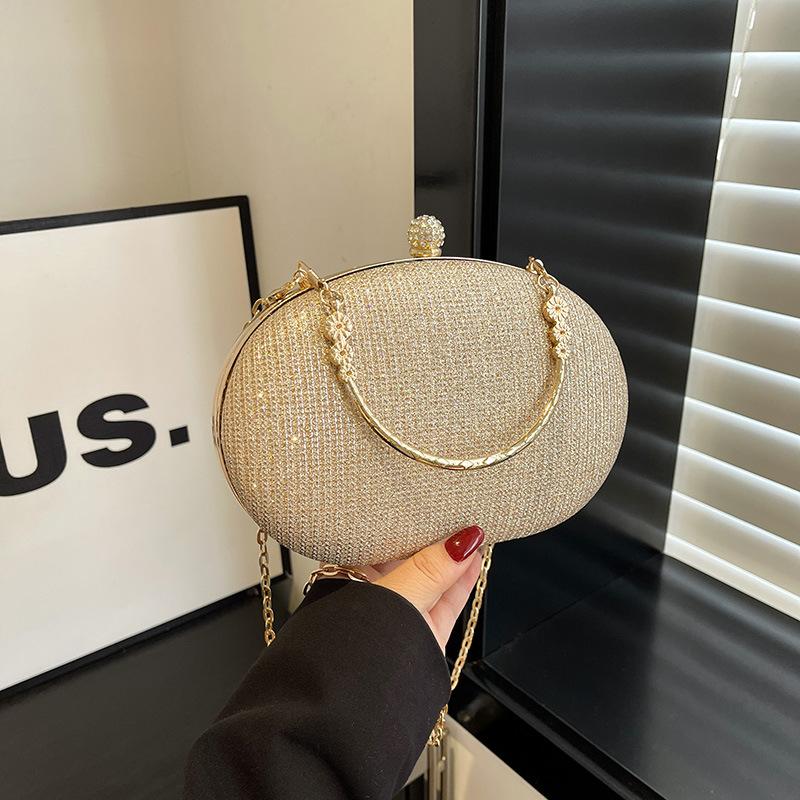 

Chain box small bag 2026 new textured metal dinner bag simple hard shell women s messenger bag золотой