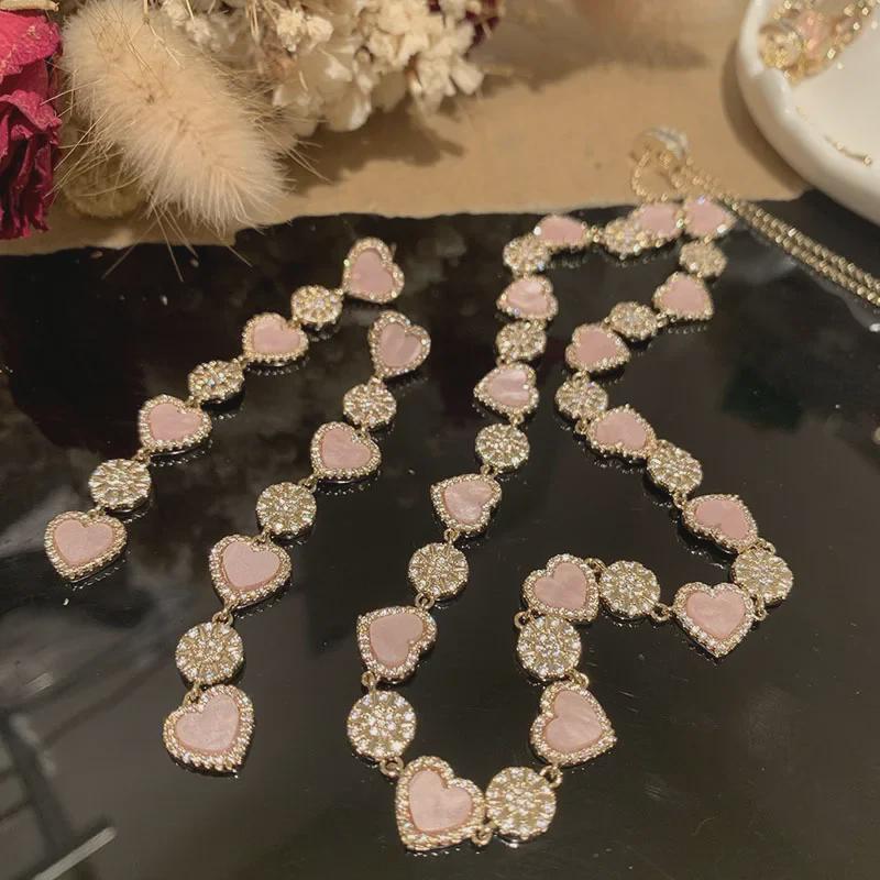 

Pink Mother-of-Pearl Heart Earrings with Long Tassel and Eight-Pointed Star, S925 Silver and Lucky Rice Shell Design. Bracelet