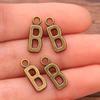 Zinc Alloy Alphabet Charms: 2 Colors, 26 Letter Pendants for Jewelry, Handbag, and Mobile Phone Accessories