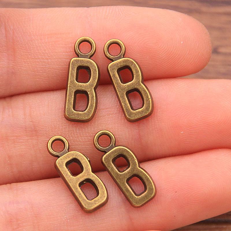 Zinc Alloy Alphabet Charms: 2 Colors, 26 Letter Pendants for Jewelry, Handbag, and Mobile Phone Accessories