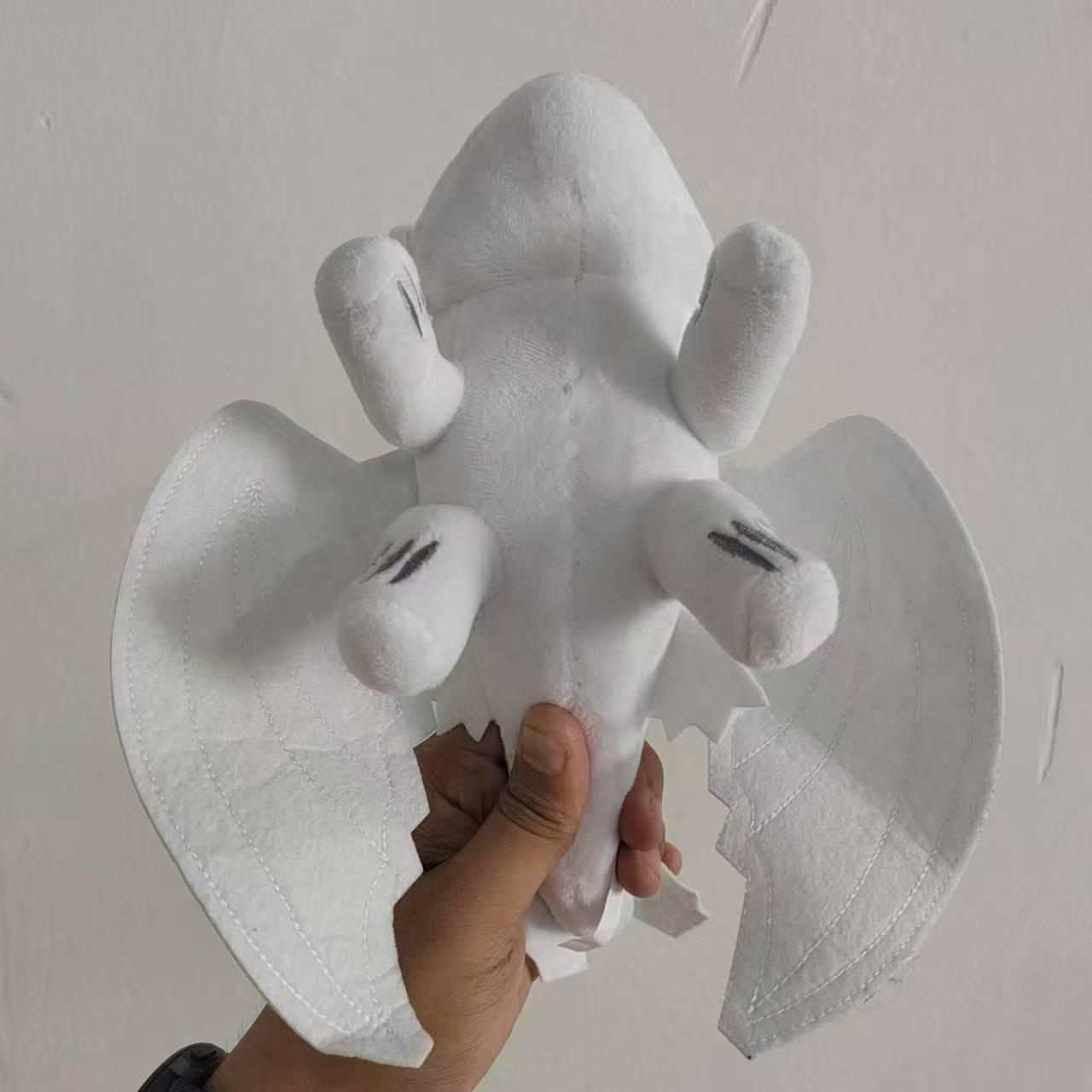 

Плюшевая игрушка на крышу машины и аксессуар-шлем Беззубик 20cm