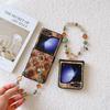 PU Leather Retro floral prints Cover with Glitter Bead Wrist Chain Strap Bracelet For Samsung Galaxy Z Flip 6 5 4 3 Phone Case