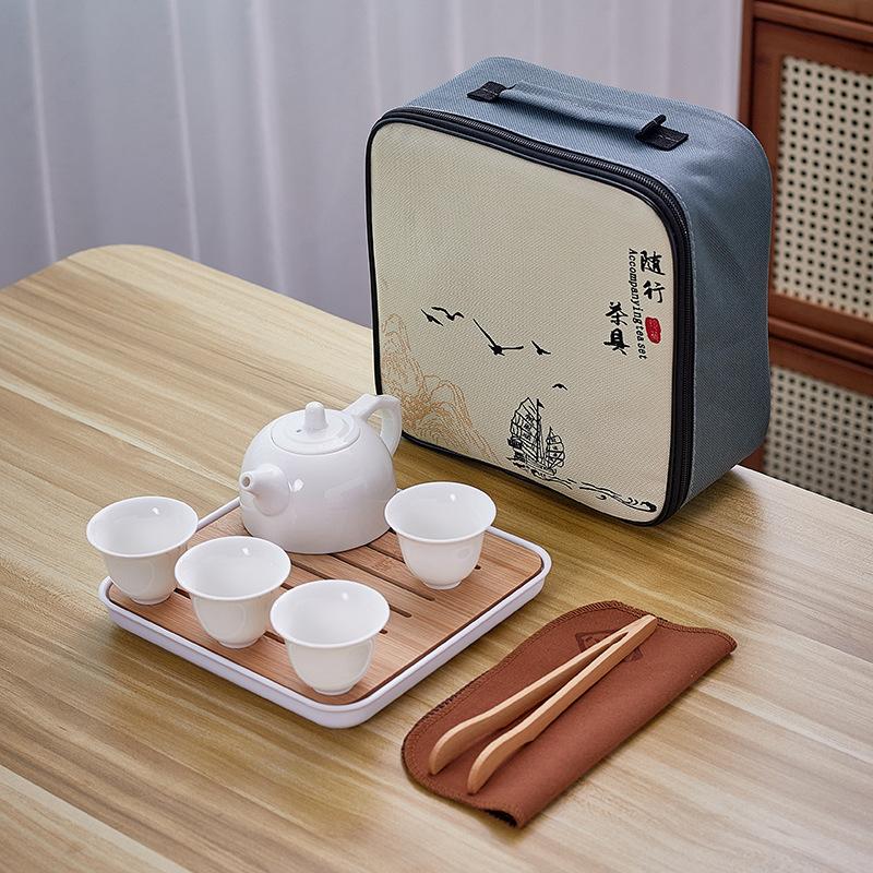 Dehua white porcelain tea set, practical ceramic cover bowl, one pot, four cups, outdoor storage, travel convenience bag, business small gifts