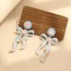 Light luxury niche pink and blue bow earrings, gold-plated temperament versatile 925 silver needle stud earrings, women's models