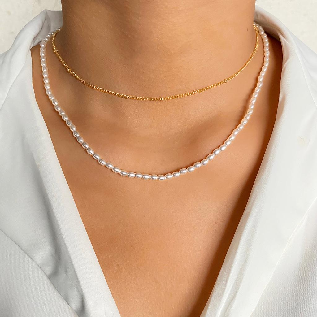 Retro Sanfte Hirse Perlen Asymmetrische herzförmige Halskette Mehrschichtige Halskette Knochen Kette Weibliche Punk Halskette Schlüsselbein Kette Schmuck