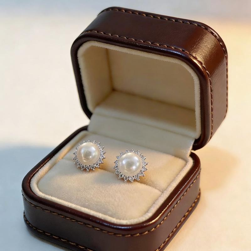Beixi Silver Sunflower Stud Earrings: S999 Silver Needle, Shell Pearl, Rhinestones, Classic & Elegant Design.