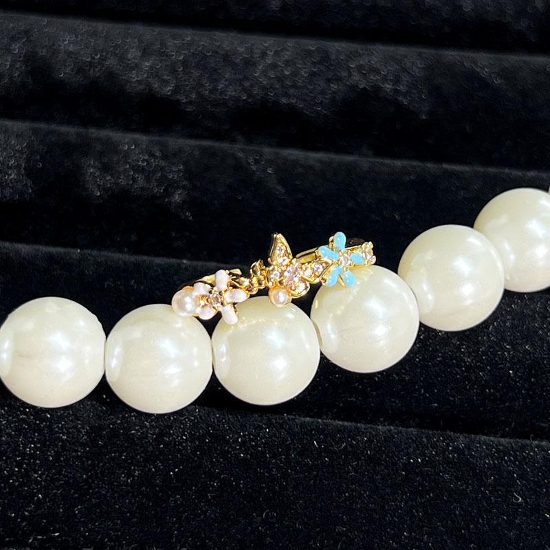 Niche exquisite light luxury high value aesthetic collection flower pearl ring female cold wind temperament stacked index finger ring