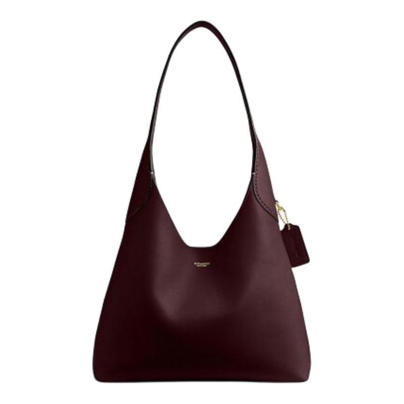 COACH Brooklyn 28 zīmola logotips govs
