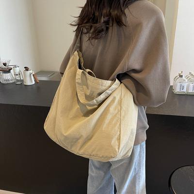 2025 New Personalized Trend High Value Shoulder Armpit Bag Solid Color Japanese Niche Design Casual Tote Bag