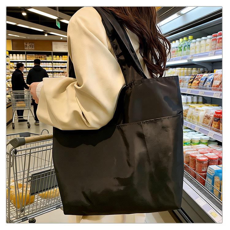 European-American Fashion Large Capacity Travel Bag - Solid Color, Nylon, Handheld or Shoulder Style for Women