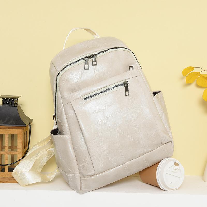Women's new style leisure trendy large capacity student backpack, fashionable and versatile PU soft leather texture backpack