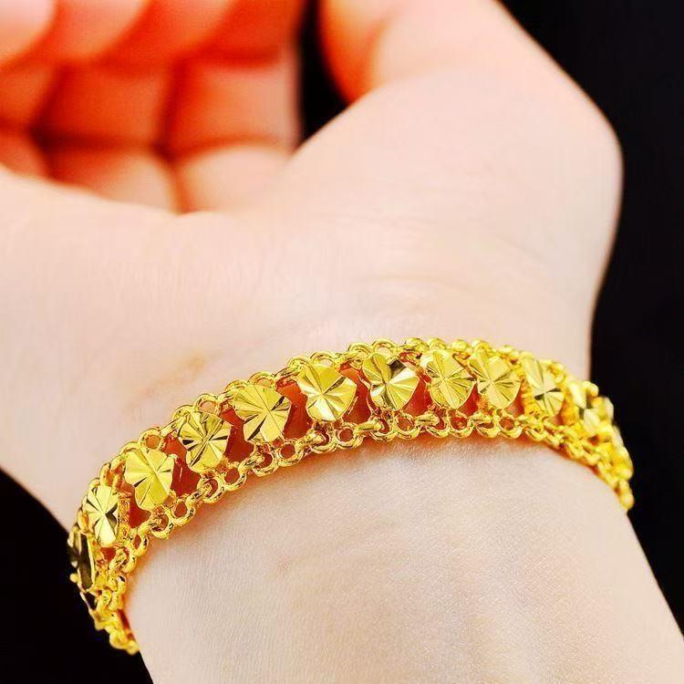 Stylish Gold Carved Love Heart Bracelet for Women - Elegant, Versatile Heart-to-Heart Design.
