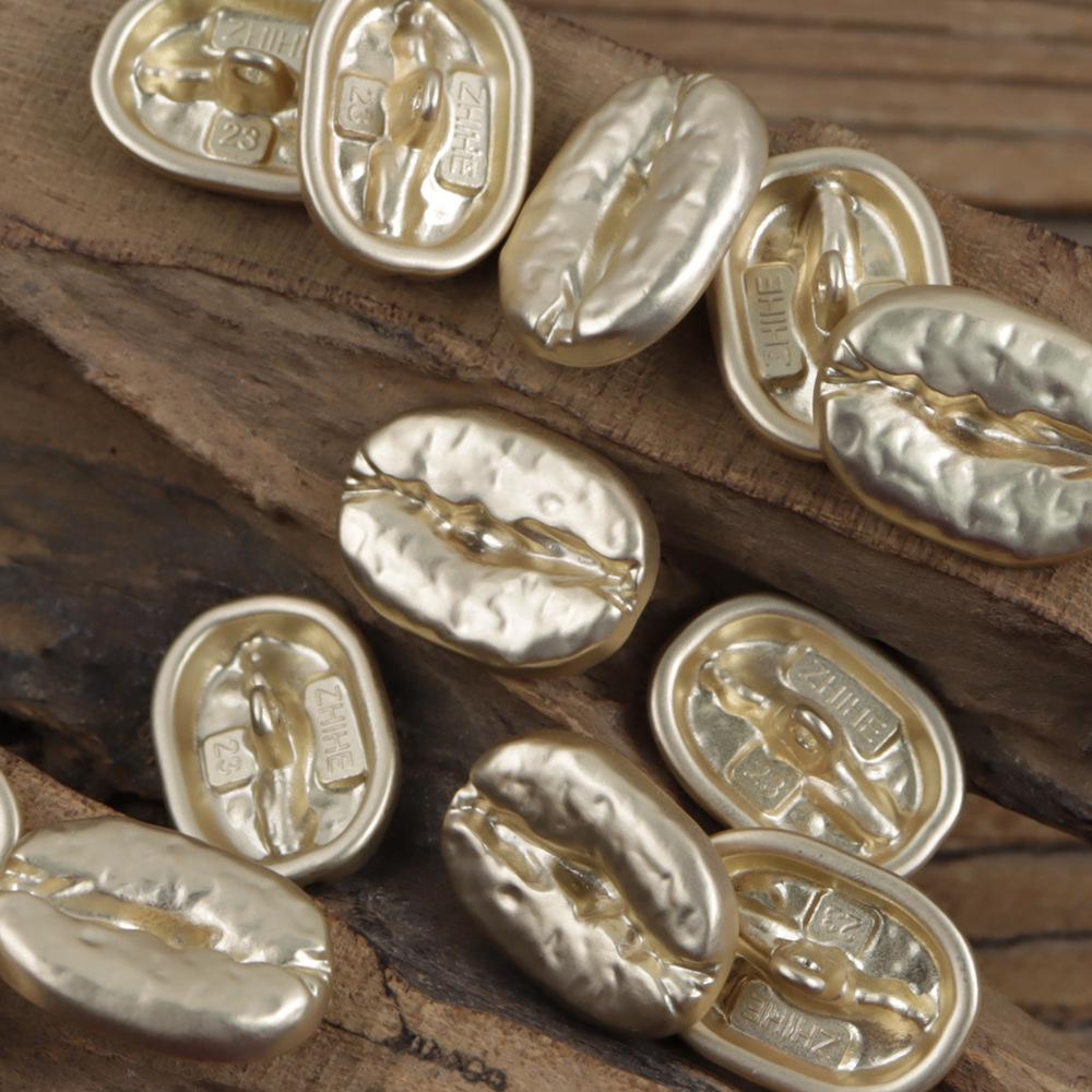 

Изысканные антикварные золотые и серебряные пуговицы в виде кофейных зерен для кардиганов