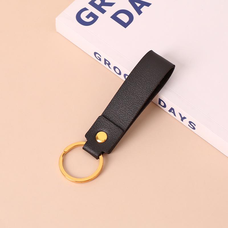 Creative Minimalist PU Leather Keychain: Solid Color Car Anti-Lost Pendant and Bag Accessory