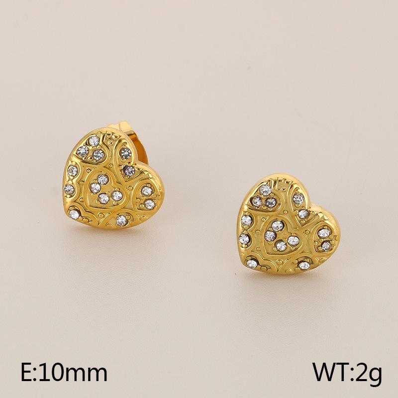 

Елегантні сережки-пусети з нержавіючої сталі з діамантами у вигляді листка гінкго