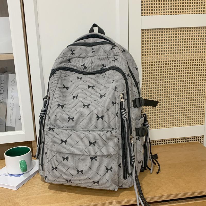 Bow Print Corduroy Backpack Casual Fashion Daily Bag Large Capacity School Bag for Students Minimalist Design Commute Travel with Tassel Accents