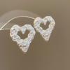 Steel needle irregular hollow love earrings fashionable simple stud earrings light luxury high-end new earrings