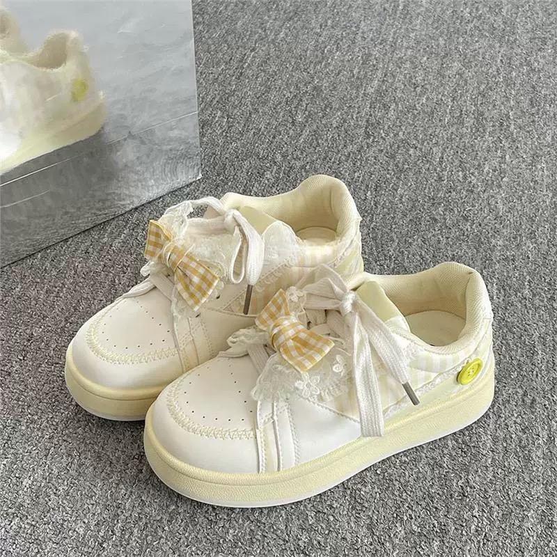 

Casual sports board shoes women s spring and autumn new non-slip thick-soled flat-soled pink white shoes women s canvas shoes 35