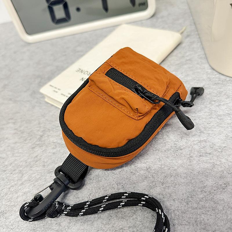 Mini halterneck bags, men's and women's coin purses, headphone bags, trendy brand personalized satchel, key bags, crossbody bags