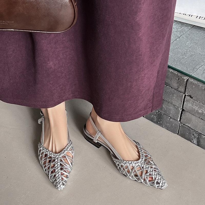 Sheepskin Korean version of niche leather woven breathable sandals women's summer flat bottom pointed hollow Muller outer wear cool slippers