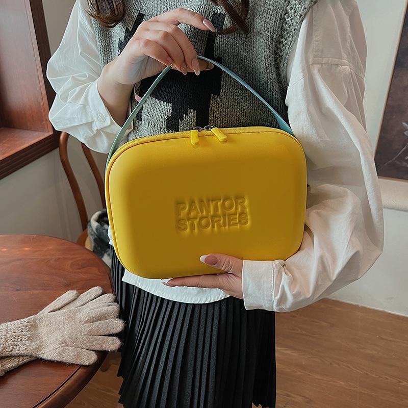 

Women s bag new fashion women s portable cosmetic bag silicone anti-splashing cosmetic case candy-colored luggage bag 24*9*18 жёлтый