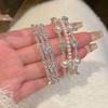 Exquisite Rhinestone Multi-layer Elastic Bracelet - Light Luxury European & American Style, Personalized High-end Versatile Accessory.
