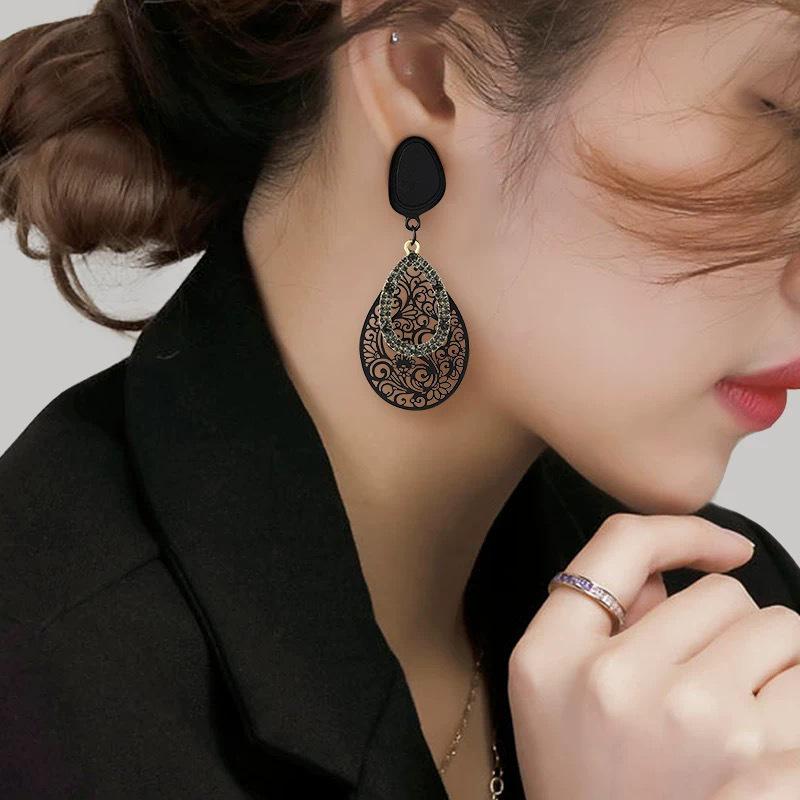 Schwarze Hohlblumenmuster Elegante Hängeohrringe - Stilvoller Nischen-Metall-Ohrschmuck