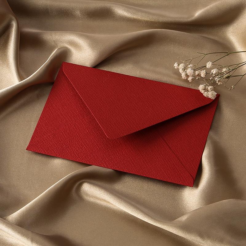 Retro Chinese Linen Pattern Letter Set with Kraft Paper, Sealing Wax, and Envelopes.