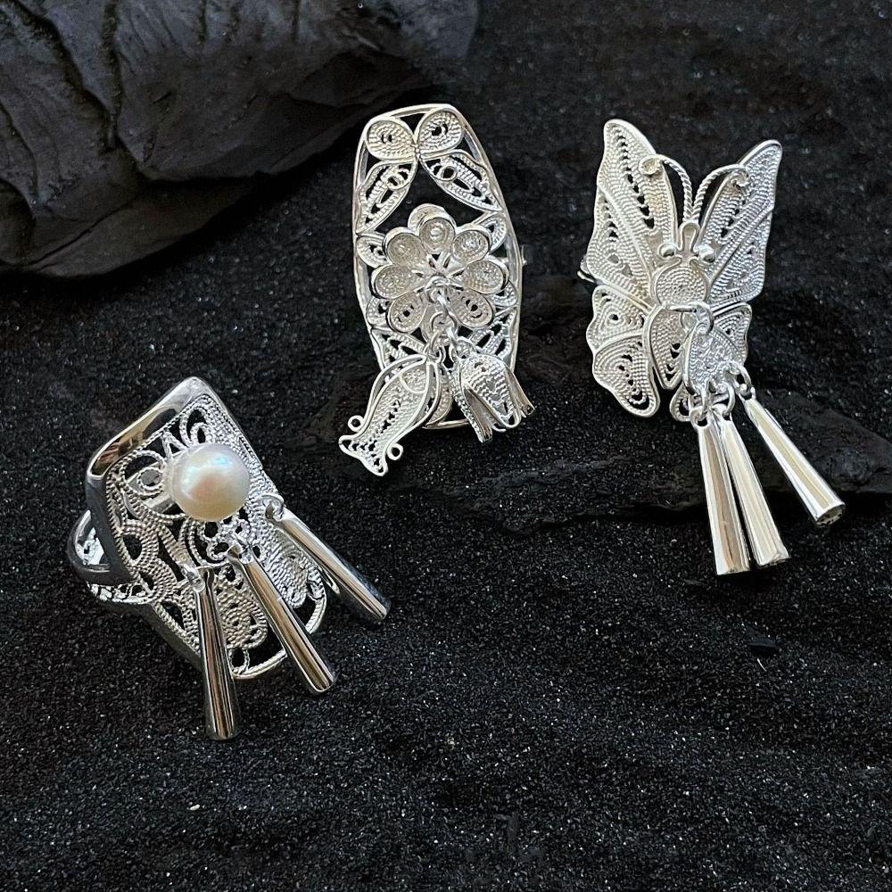 

Полое винтажное кольцо с детальной резьбой, открывающееся на палец, символ красоты и свободы