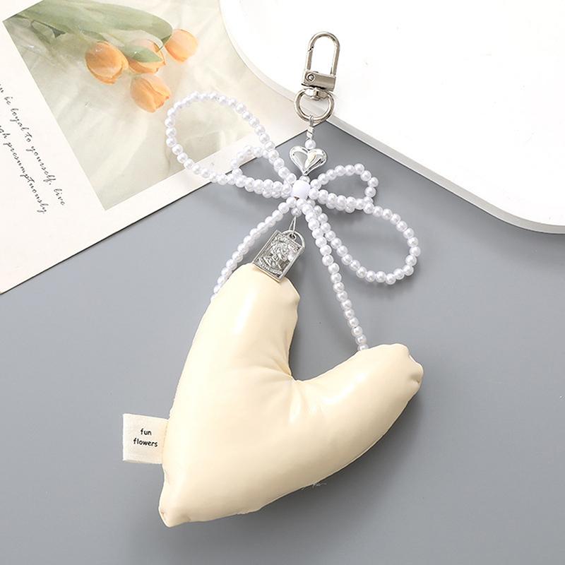 

Sweet Three Dimensional Leather Heart-Shaped Bow Pendant Keychain Candy Color Cotton Filling Backpack Hangings Decoration Gift as the picture