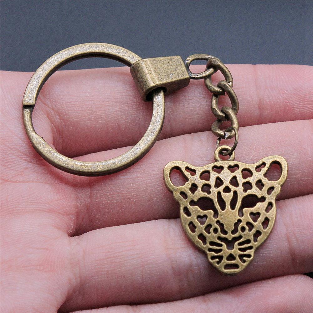Dinosaur Animal Prehistoric Creature Pendant Antique Bronze Metal Keychain with 30mm Ring for Women High Quality