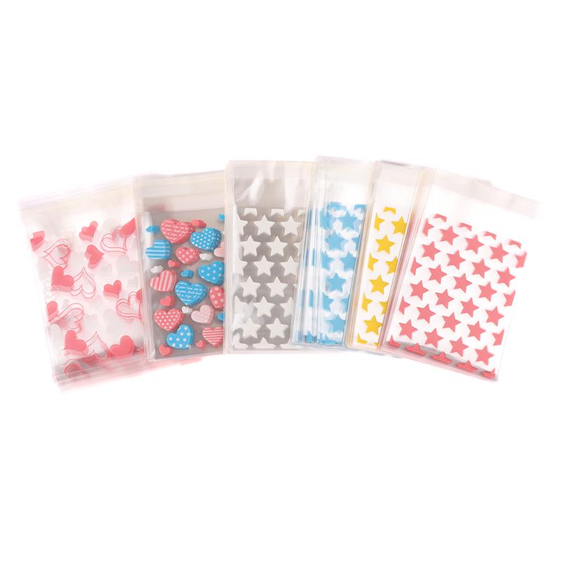 50 ks Průhledné plastové hvězdičkové šperky Samolepicí sáček Cukroví Držák na karty Skladování fotografií Dárkové balicí sáčky
