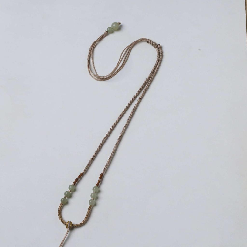 Elegant Unisex Jade Peace Buckle Pendant Necklace with Thin Red Rope