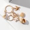 Exquisite Shell Keychain Conch Starfish and Star Pendant Keyring Bag Decoration Fashionable Beach Vacation Accessory