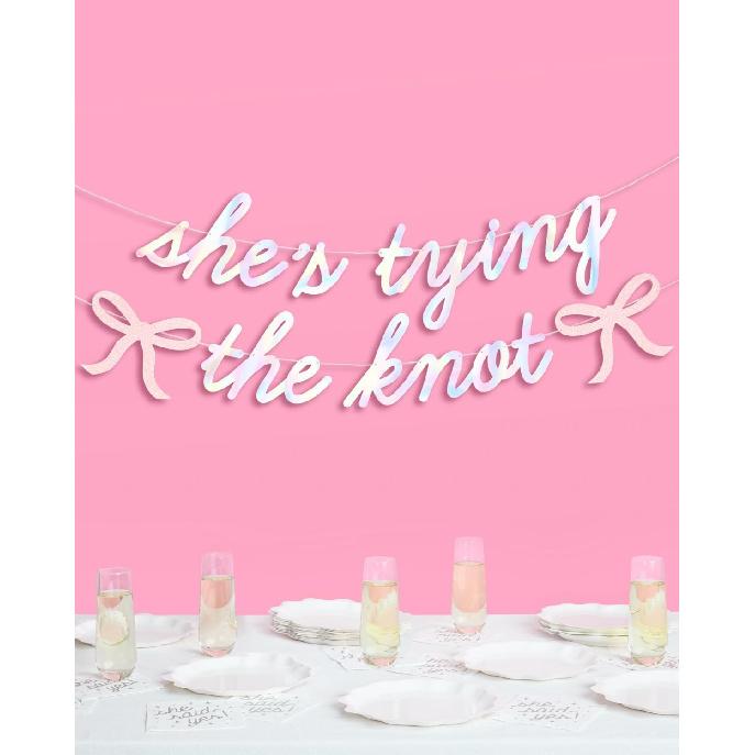 xo, Fetti She's Tying the Knot Banner - Iridescent Foil | 4.5 Ft. | Bow Bachelorette Decorations, Engagement Party Sign, Proposal Background, Bach