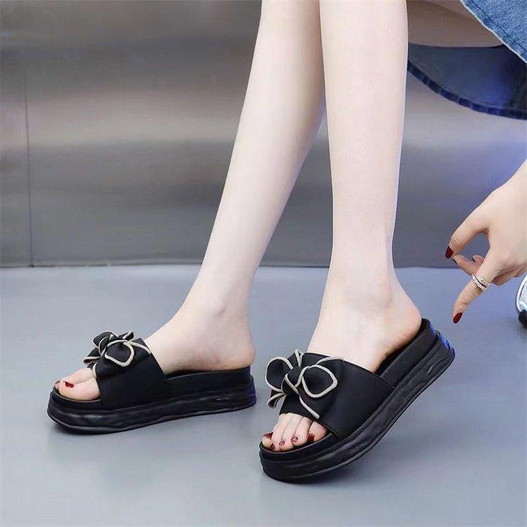 

Slippers female summer go out thick-soled bow 2025 new wear soft-soled fashion fairy one-word cool slippers explosion 35