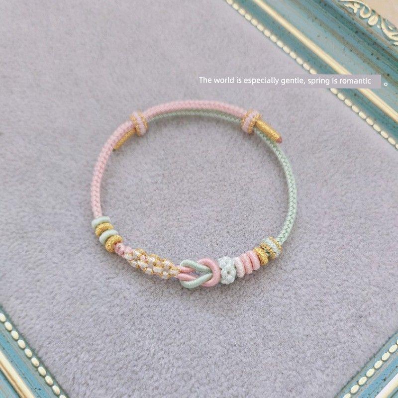 

Плетеный вручную шнурок-браслет, который могут носить мужчины и женщины, с золотыми бусинами на удачу, плетеный шнурок, полуфабрикаты для DIY, красный шнурок Мо Сян Pink Green [Mo Xiangli]]